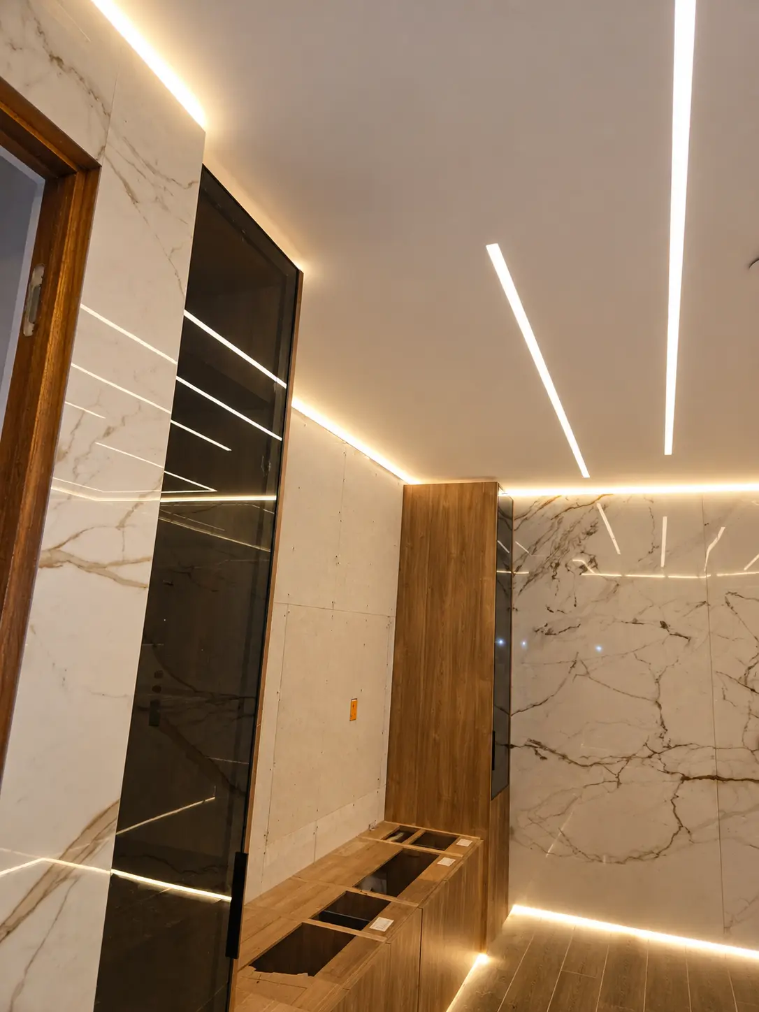 Bathroom and vanity area with linear and perimeter LED lighting